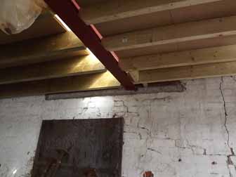 View of timbers supporting the mezzanine floor.