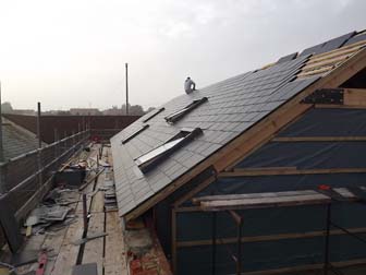 Full length view of roof - South side.