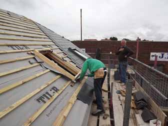 Jim checking on the Roofer's progress.